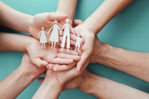 Hands,Holding,Paper,Family,Cutout,,Family,Home,,Adoption,,Foster,Care, adoption education, adoption information, adoptive parent education